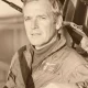 Sepia portrait of pilot in flight suit