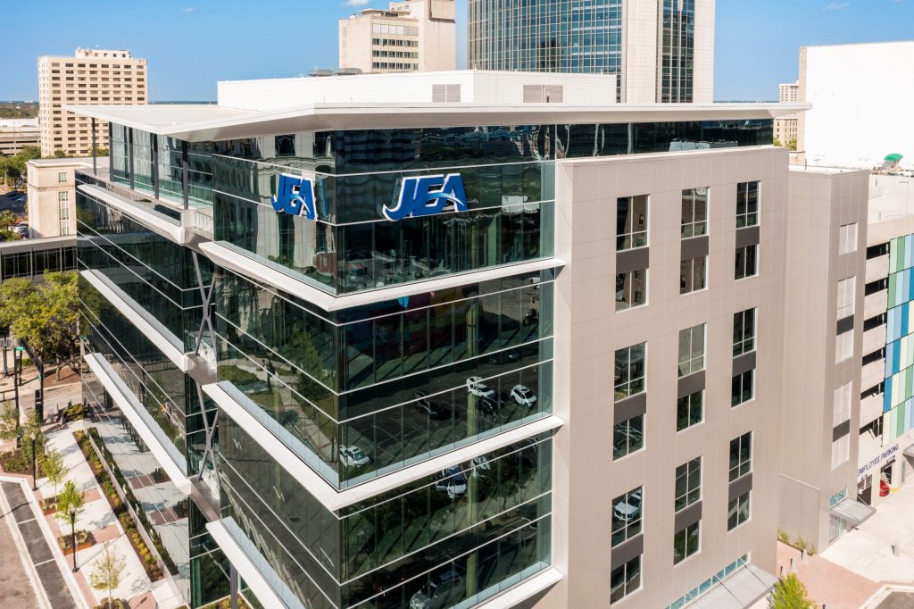 JEA logo on modern glass office building