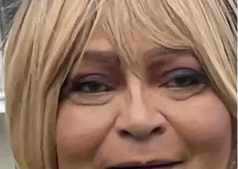 Close-up of woman with short blonde bob haircut