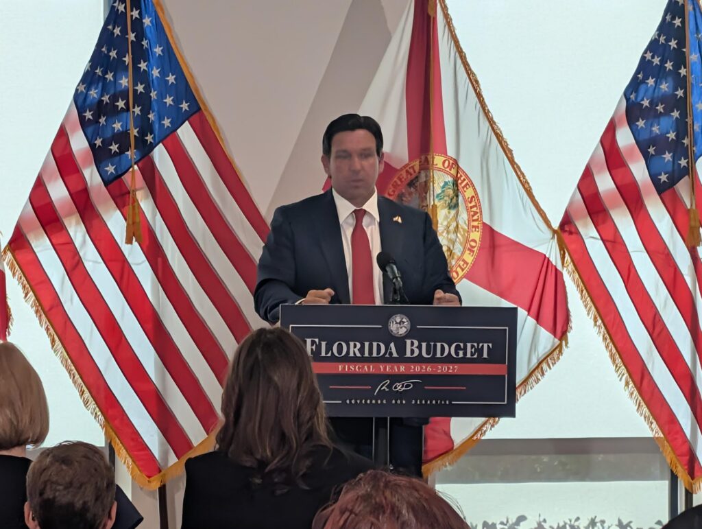 Man speaks at Florida budget press conference