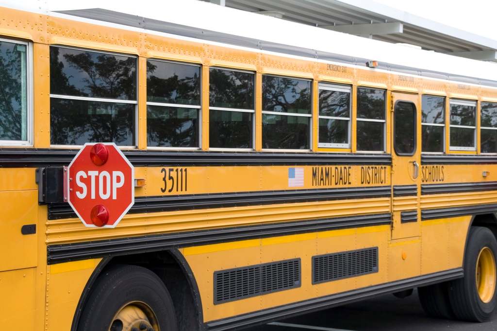 Yellow Miami-Dade school bus with stop sign