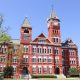 Historic red-brick building with clock tower