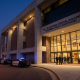 Police cars outside county courthouse at dusk