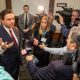 Politician speaking to reporters at press conference