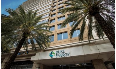 Duke Energy building exterior with palm trees