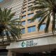 Duke Energy building exterior with palm trees