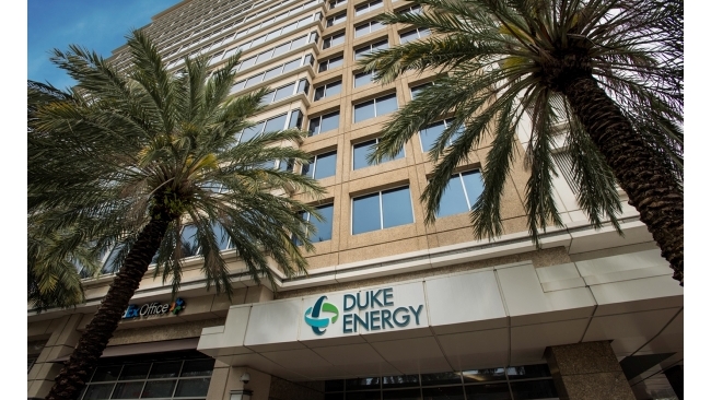Duke Energy building exterior with palm trees