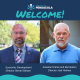City of Pensacola welcome banner with two officials