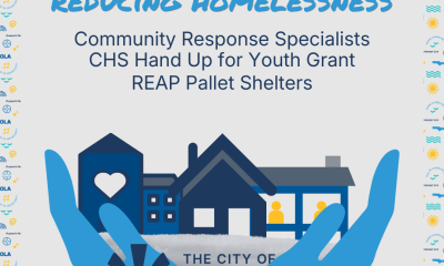 Reducing Homelessness graphic with houses in hands