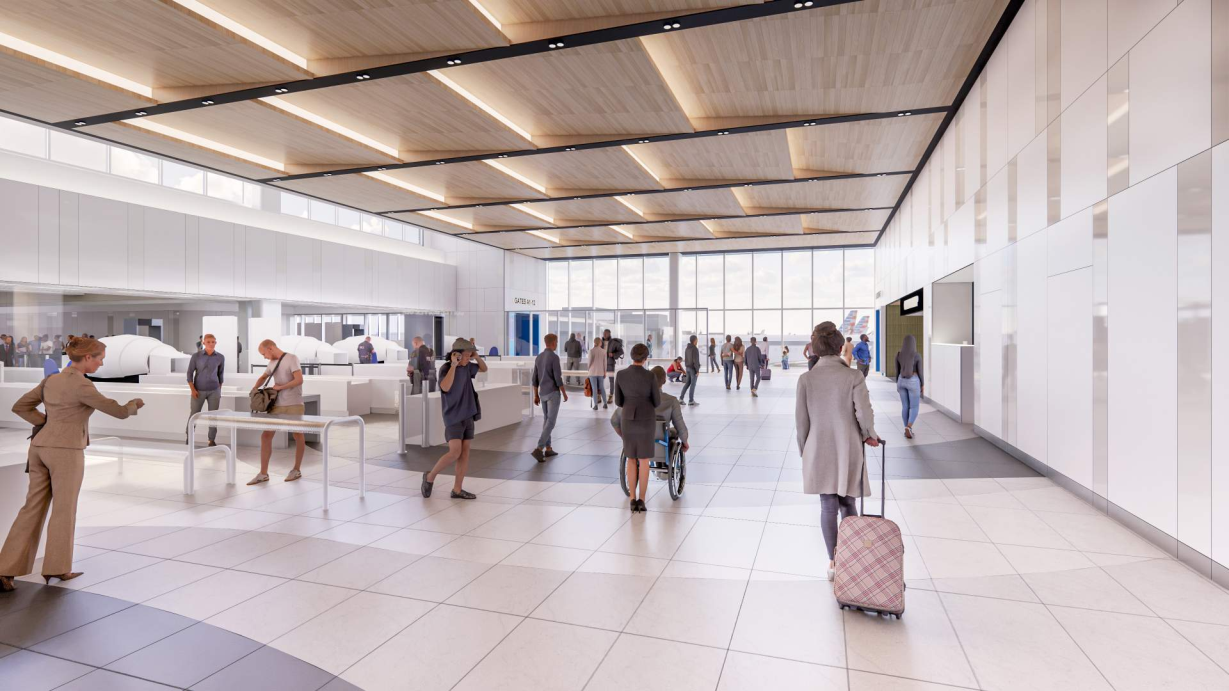 Modern airport terminal with travelers and security checkpoint