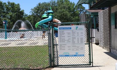 Entrance gate to Roger Scott Pool with slides