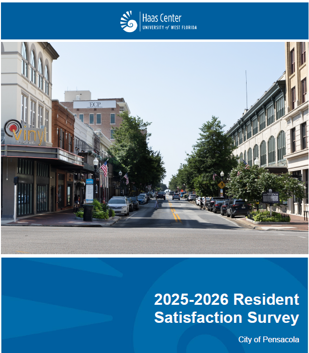 Downtown Pensacola street with survey banner