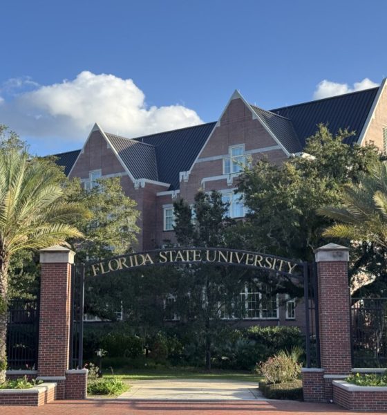 Florida State University entrance with brick building and palms