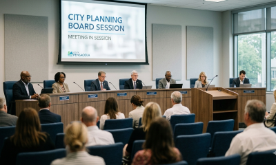 City planning board meeting with seated officials