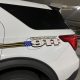 Emergency 911 decal on white SUV