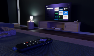 Remote control on table facing smart TV