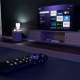 Remote control on table facing smart TV