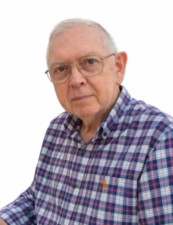 Older man wearing glasses and plaid shirt