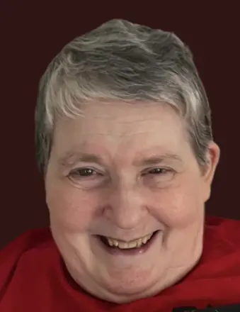 Smiling older woman with short gray hair