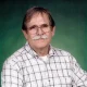Older man with glasses and mustache portrait