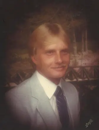 Vintage portrait of man in light suit and tie
