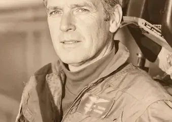 Sepia portrait of pilot in flight suit
