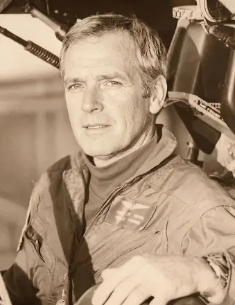 Sepia portrait of pilot in flight suit