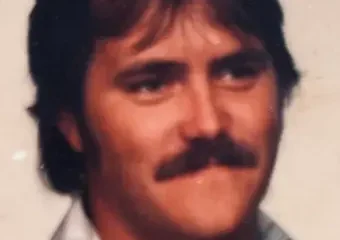 Vintage portrait of mustached man with dark hair