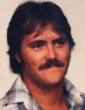 Vintage portrait of mustached man with dark hair