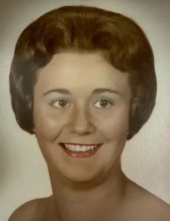 Vintage portrait of smiling woman with short brown hair