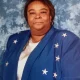 Woman in blue star-patterned blazer portrait