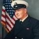 U.S. Navy officer portrait with American flag