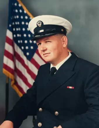 U.S. Navy officer portrait with American flag