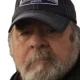 Older bearded man wearing Old Guys Rule cap
