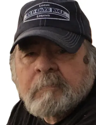 Older bearded man wearing Old Guys Rule cap