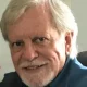Older man with white hair and beard
