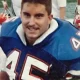 Football player in blue jersey number 45