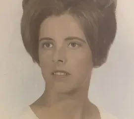 Vintage portrait of woman with voluminous updo hairstyle