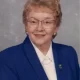 Elderly woman in blue blazer portrait