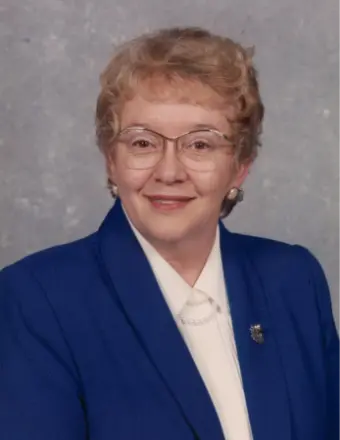 Elderly woman in blue blazer portrait