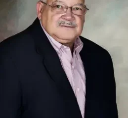 Older man in suit and glasses portrait