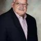 Older man in suit and glasses portrait