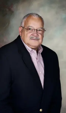 Older man in suit and glasses portrait