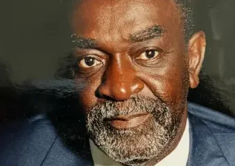 Portrait of older man in suit and tie