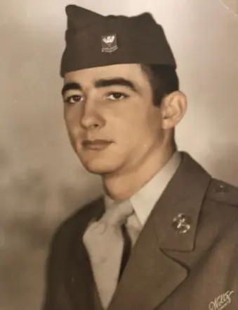 Vintage portrait of young soldier in uniform