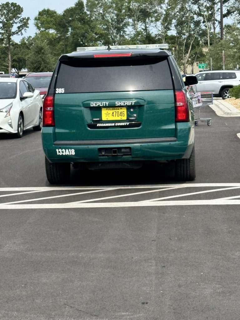 Escambia County sheriff SUV in parking lot