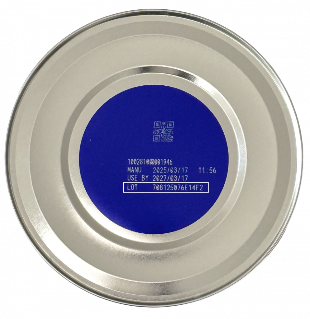 Bottom of metal can with date label