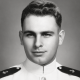 Black-and-white portrait of young man in military uniform
