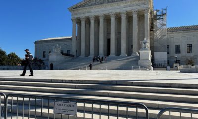 U.S. Supreme Court building with closed area sign