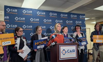 CAIR Florida press conference with speakers and signs